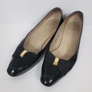 Salvatore Ferragamo black and gold bow heels Sz 7B